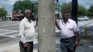 Pictured on Tuesday, April 16, 2013 at the Historic Broad Street Slave Market Pillar in Augusta, GA are social justice activists Arthur Smith, Jr. (left), a resident of the Hyde Park neighborhood in south Augusta (infamous for an industrial environmental racism scandal that killed countless blacks) - and the Rev. Zack Lyde (right) of Brunswick, Georgia, who has actively battled many forms of racism in Georgia and the South East. (Photo by Rev. Terence A. Dicks of Augusta)